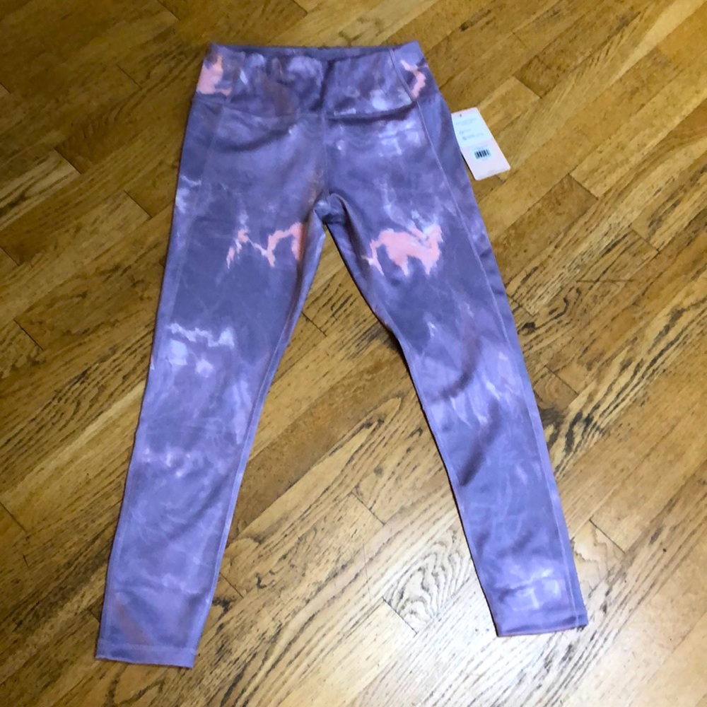 San skin new leggings. Pastel purple and pink color.